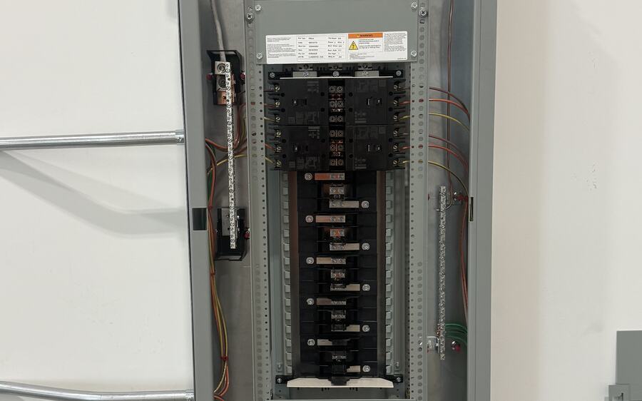 Newly installed electrical panel with neatly routed circuits